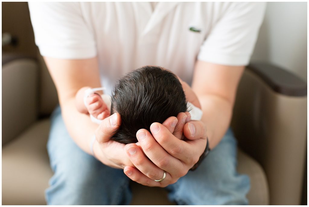 Father holding baby