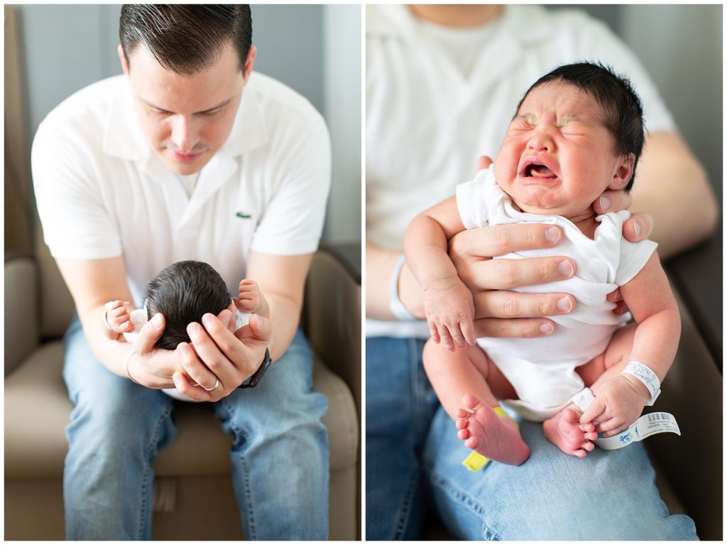 Father holding newborn