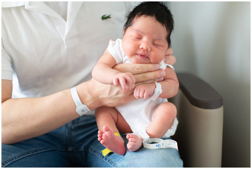 Daddy holding baby