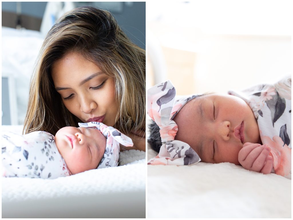 mom kissing newborn